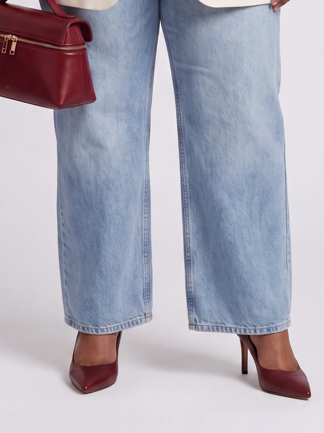 Burgundy pointed-toe pumps with slim heels